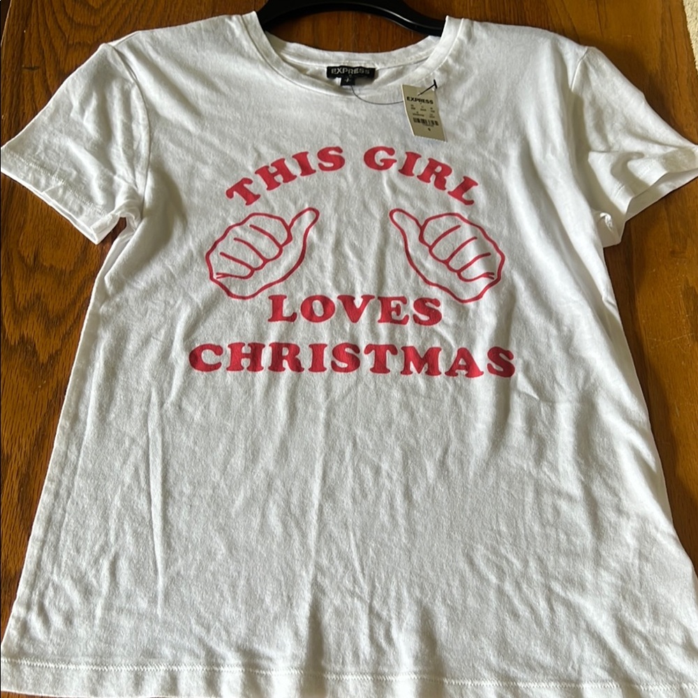 Express White T-Shirt with THIS GIRL LOVES CHRISTMAS in bold RED LETTERING